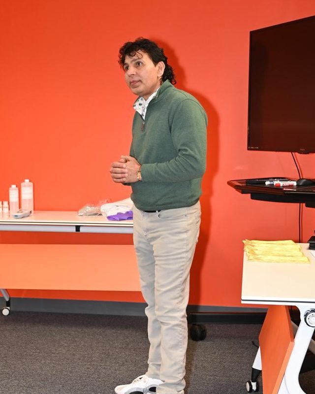 Yogesh Sharma, founder of Free Education Staffing, teaching a class